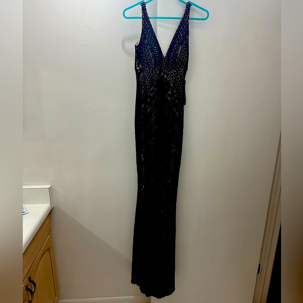 Black lace Jump apparel gown. Size 1/2. Never worn. Brand new with tags